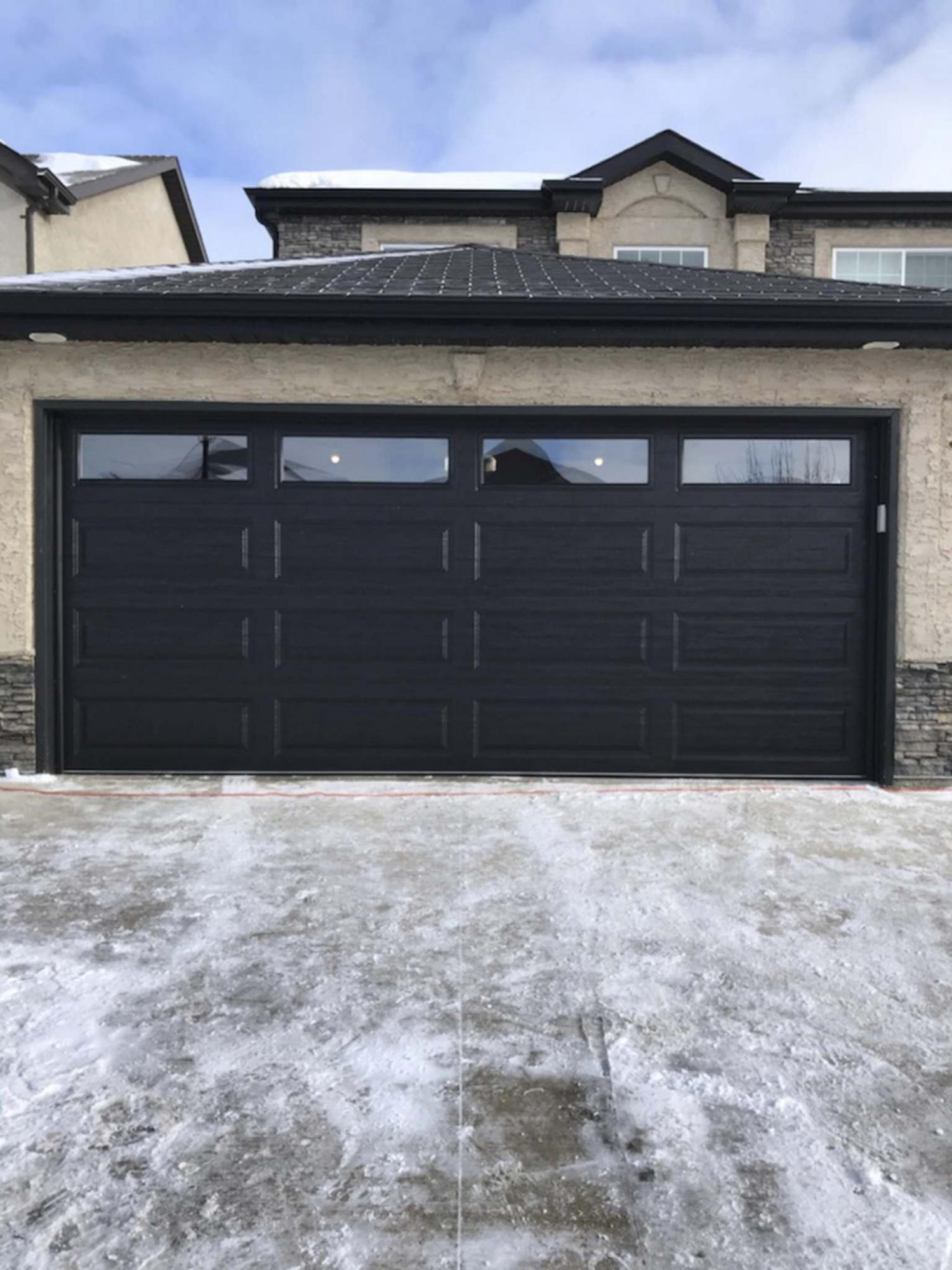 <p>Supplied photos / Trapp Doors</p><p>This new door with windows not only brings daylight into this garage, it also dramatically improved the home&rsquo;s curb-appeal over the old and weathered door. </p></p>