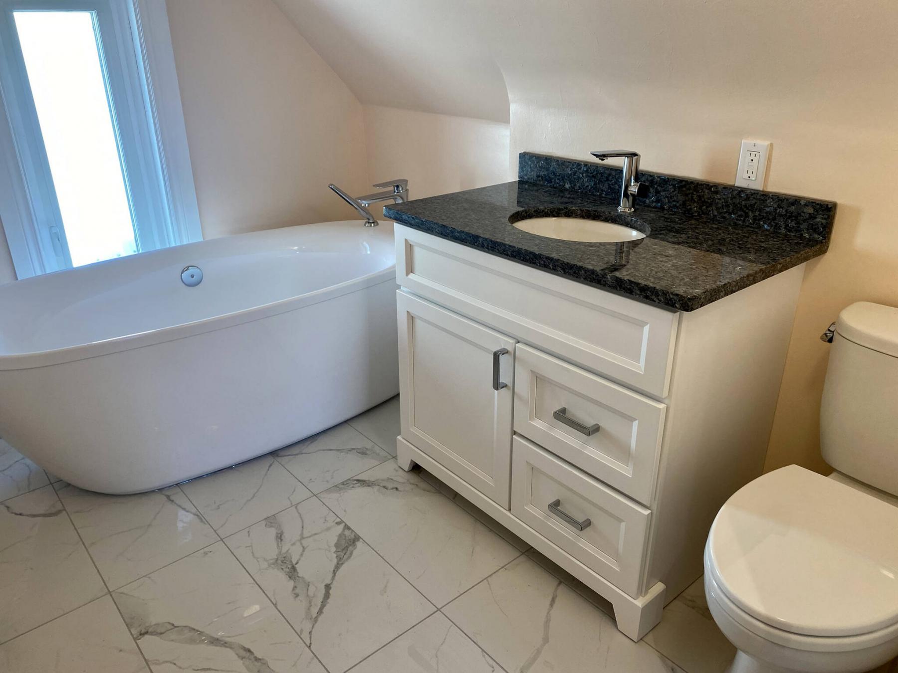 <p>Photos by Marc LaBossiere / Winnipeg Free Press</p><p>The stand-alone tub parallel to the back wall allows for a wider sink and vanity.</p>