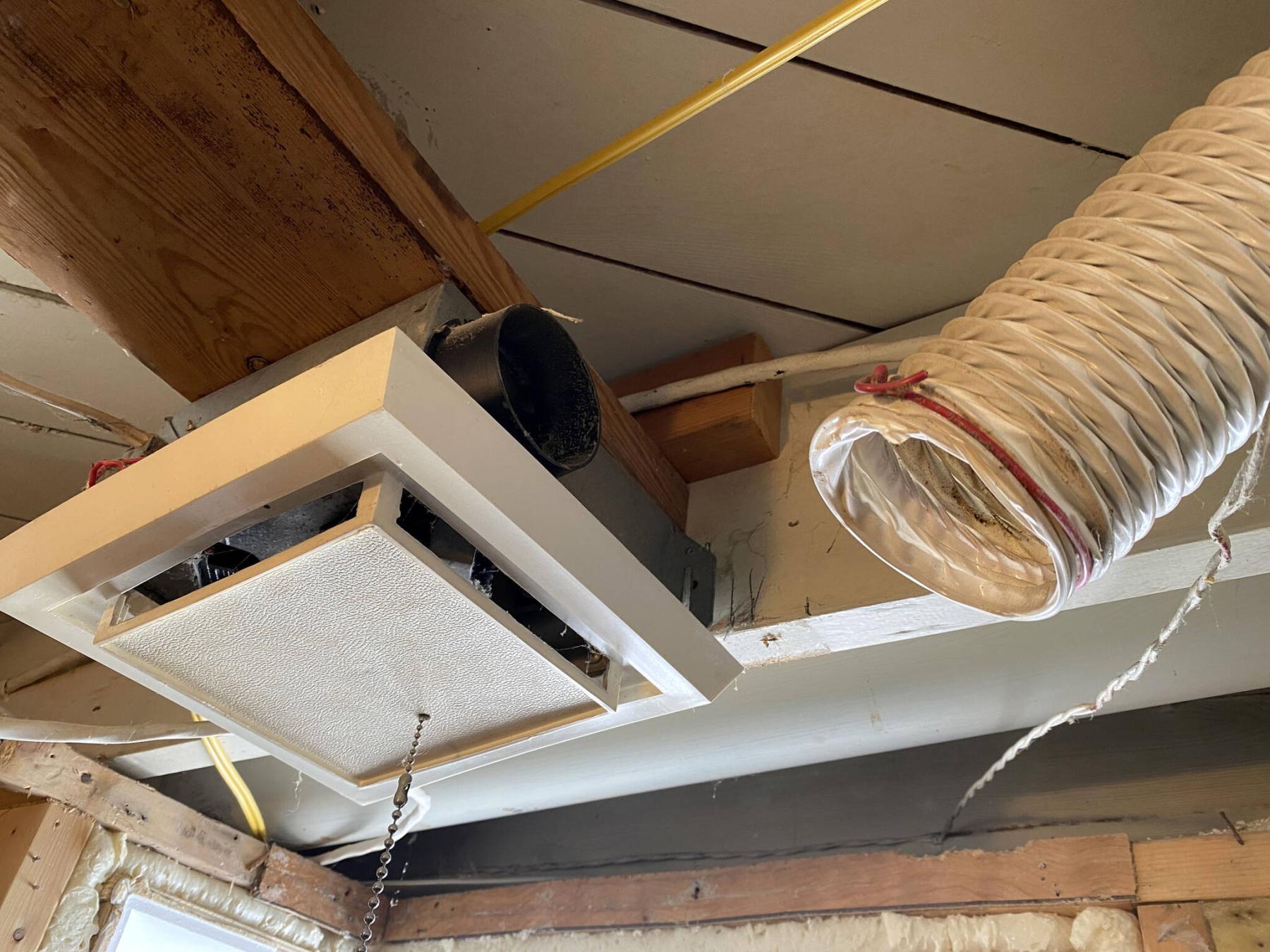  <p>Marc LaBossiere / Free Press</p>
                                <p>With ceiling tiles fastened to joists, it was impossible to know the vent hose had come away from the vent housing.</p> 