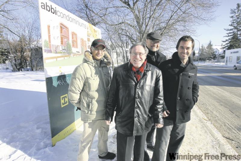 Partners, from left: Satish Abbi, Phil Dlot, Bill Thiessen and Helio Rodgrigues plan to start digging in the next couple of weeks for ABBI Condominiums, seen in renderings below.