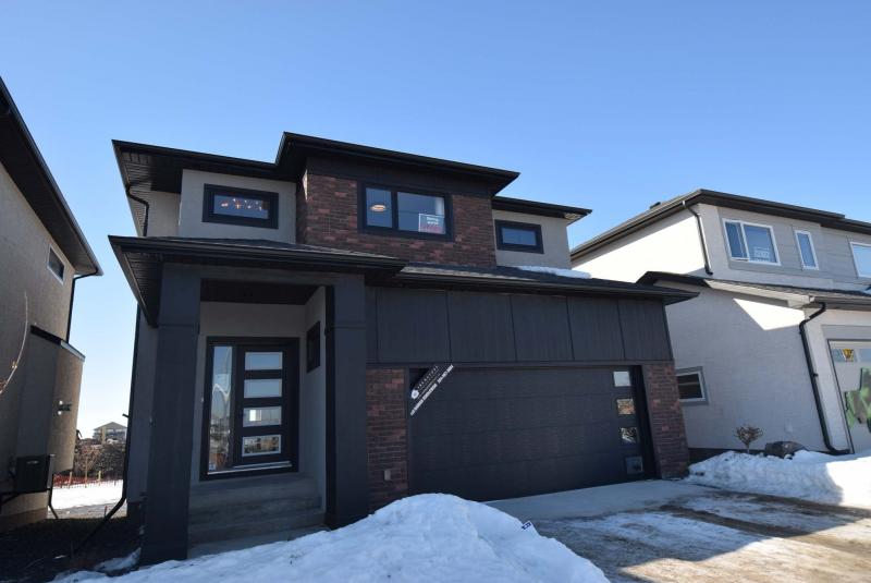 <p>Photos by Todd Lewys / Winnipeg Free Press</p><p>You might just fall in love with the Bloom before ever setting foot inside &mdash; dark board, batten siding and acrylic stucco contrast beautifully with weathered red-brick detailing.</p></p>