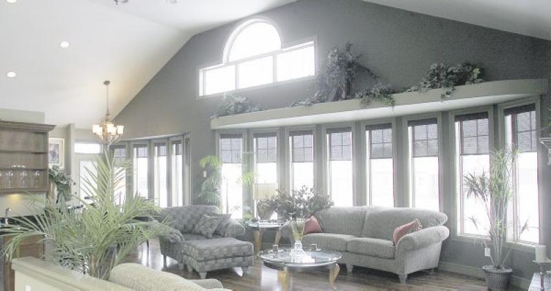 Now this is a great room. The Hilton show home at 128 River's Edge Drive is built more for entertaining friends than housing children, and it shows in the massive great room that looks perfect for lar