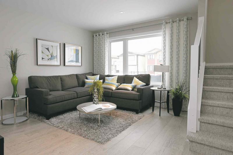 A large picture window in the main living area provides plenty of natural light. 