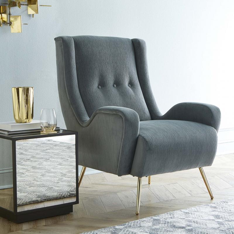 <p>DWELLSTUDIO</p><p>A curvier silhouette and metallic accents &mdash; collectively comprising a more modern take on midcentury styling &mdash; are just some of the big trends in chairs.</p>