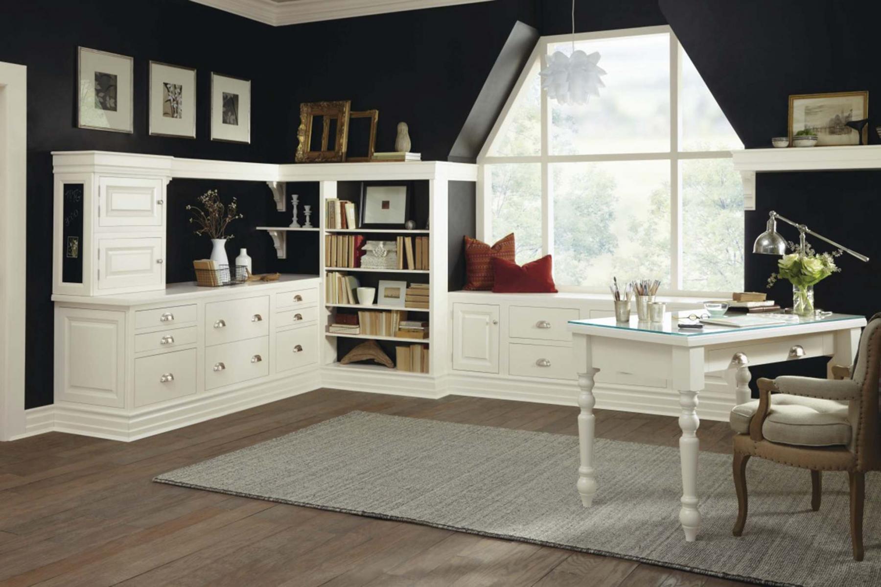<p>MasterBrand Cabinets / Akron Beacon Journal</p><p>Juxtaposed against plenty of white cabinetry and trim, the black walls of this home office serve as a dramatic accent. </p>