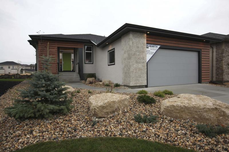 <p>RUTH BONNEVILLE / WINNIPEG FREE PRESS</p><p>This Hearth Homes bungalow will be on display during the Fall Parade of Homes.</p></p></p>
