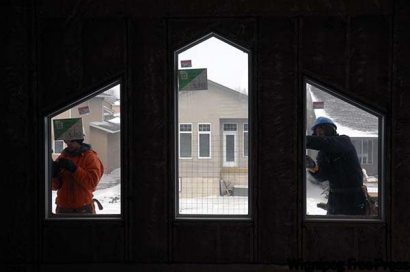 Workers install the crimped stucco wire around windows. When installed initially, stucco should sufficiently protect the wire from moisture. However, when the stucco is cut to allow for the installati