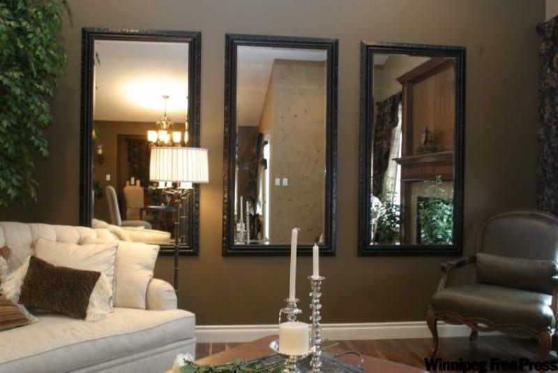 A mirrored wall adds class and a spacious feel to a room, but limit the mirrors to one wall. 