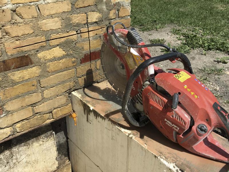 <p>Photos by Marc LaBossiere / Winnipeg Free Press</p><p>This 14-inch diamond blade masonry saw is the tool I used to cut away sections of the brick facing on the exterior of my house during an addition. Cut lines are visible in the brick.</p>
