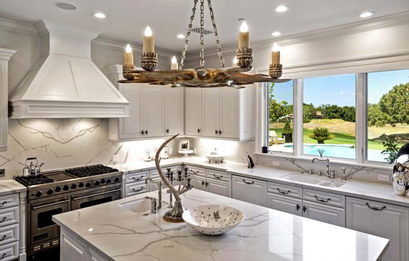 <p>Simon Berlyn / TNS</p><p>The home features marble countertops.</p></p>
