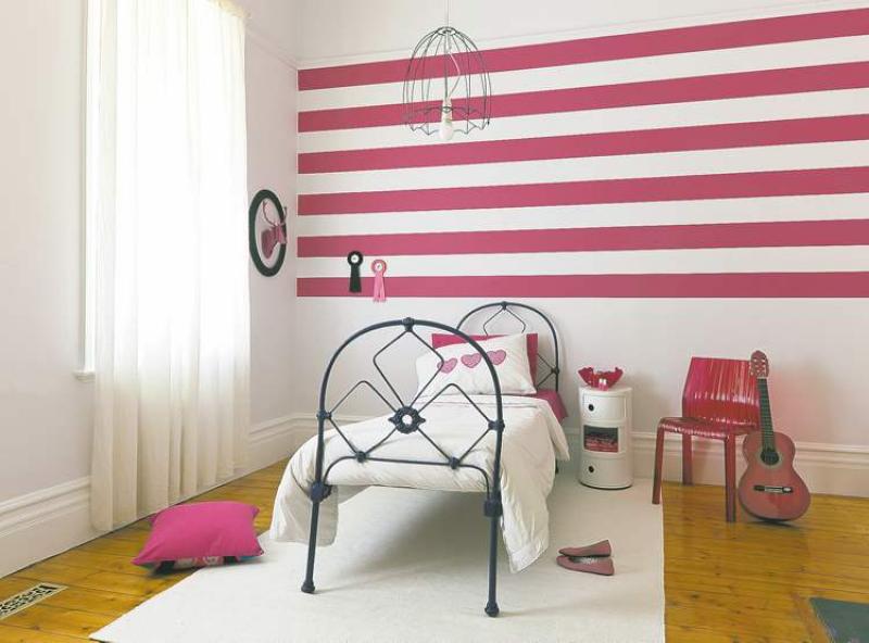 The cheerful room pictured here is a great example of how a little colour can brighten up a lacklustre room and turn it into a fun space for kids. The colour palette in this particular room includes Dulux paint colours Peplum White, Lickedy Lick and Violet Ink.