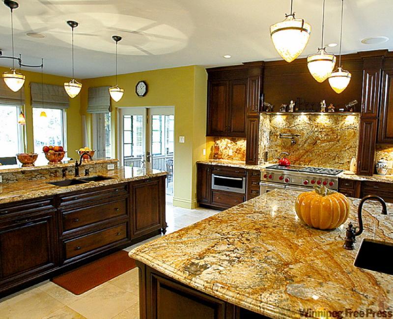 Crown mouldings and accent colours are quick, easy ways to refresh a  kitchen.