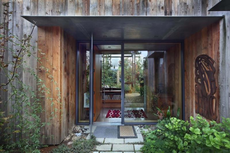 <p>The reclaimed exterior fir has no finish whatsoever. The siding is from an old fruit warehouse in Spokane. (Photos by Steve Ringman/The Seattle Times)</p>