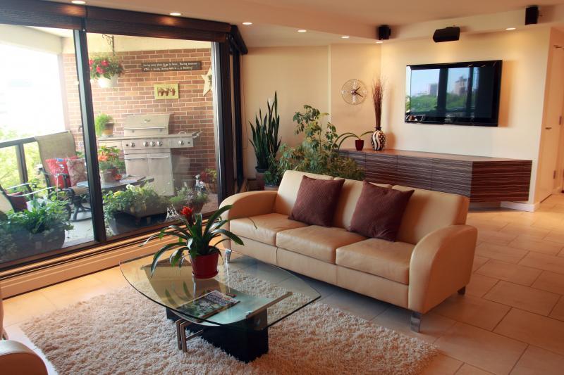Living room has an enticing view of the balcony.