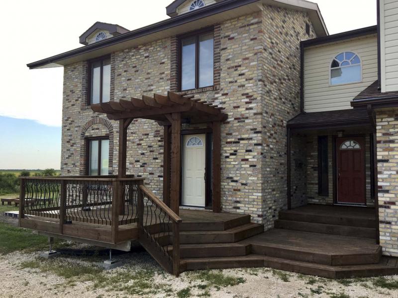 <p>Photos by Marc LaBossiere / Winnipeg Free Press</p><p>The front deck of my home looks much better now that it has had a proper reapplication of stain.</p></p>