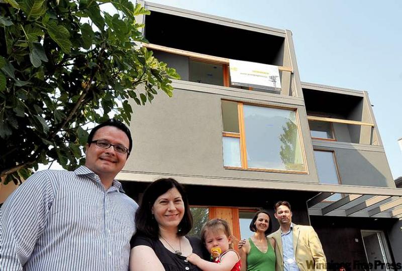 From left, Damian Stathonikos, wife and co-developer Allisa Arnold, architect's wife Mariana Brussoni and architect Nick Sully. 