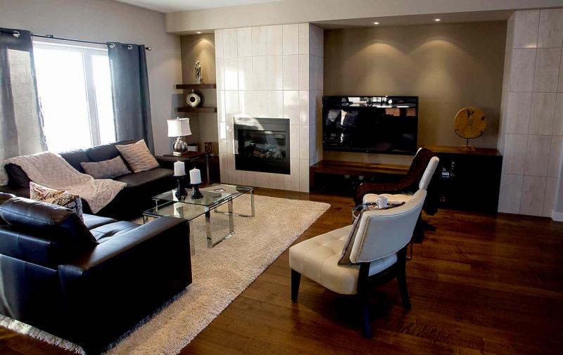 The family room contains a huge picture window on the rear wall.