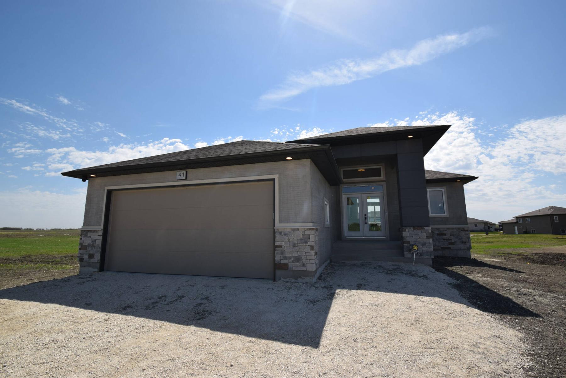  <p>TODD LEWYS / FREE PRESS</p>
                                <p>A brand-new plan, the 1,427-sq.-ft. Mallard design, delivers style at a more affordable price, without sacrificing livability.</p> 
