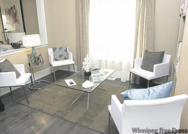 The monochrome colour scheme of neutral browns promotes a relaxing atmosphere in this sitting room.