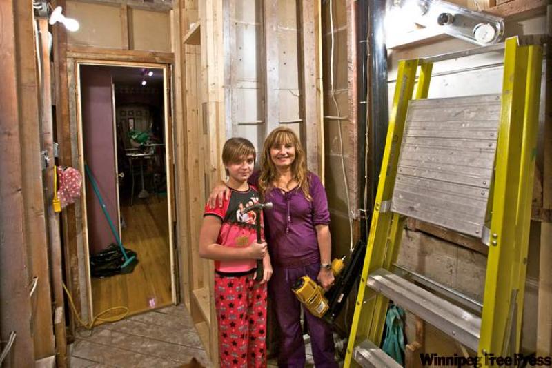 Dan Rohr's daughter Mercedes and girlfriend Celia in the midst of bathroom DIY renovation, and finishing up (below).