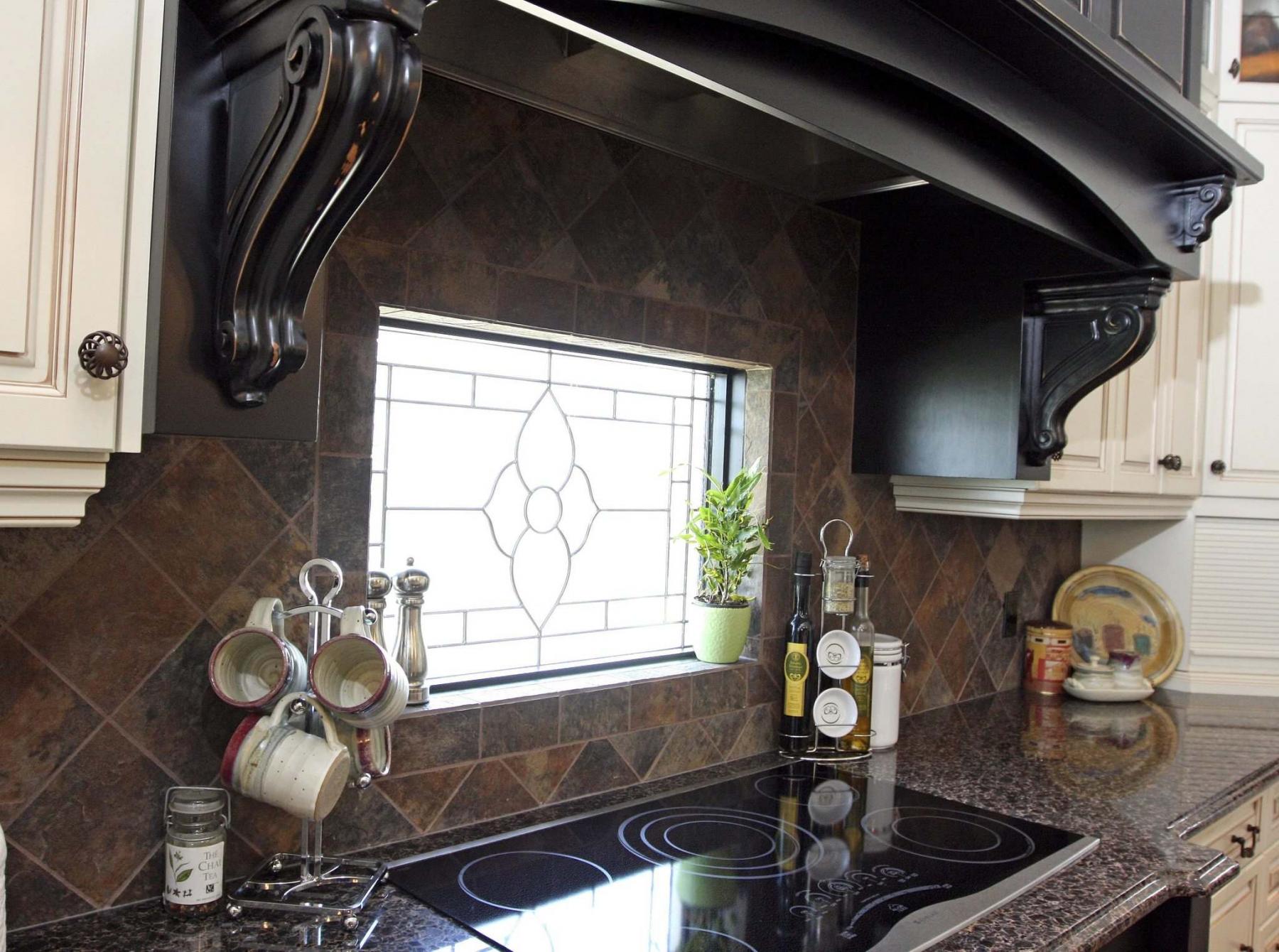 cleaning stove top with baking soda and dish soap