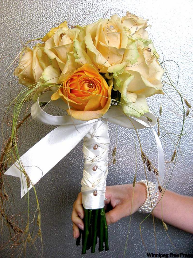 Flowers in a few shades of one colour, set off only by white ribbon, are a trendy choice. 