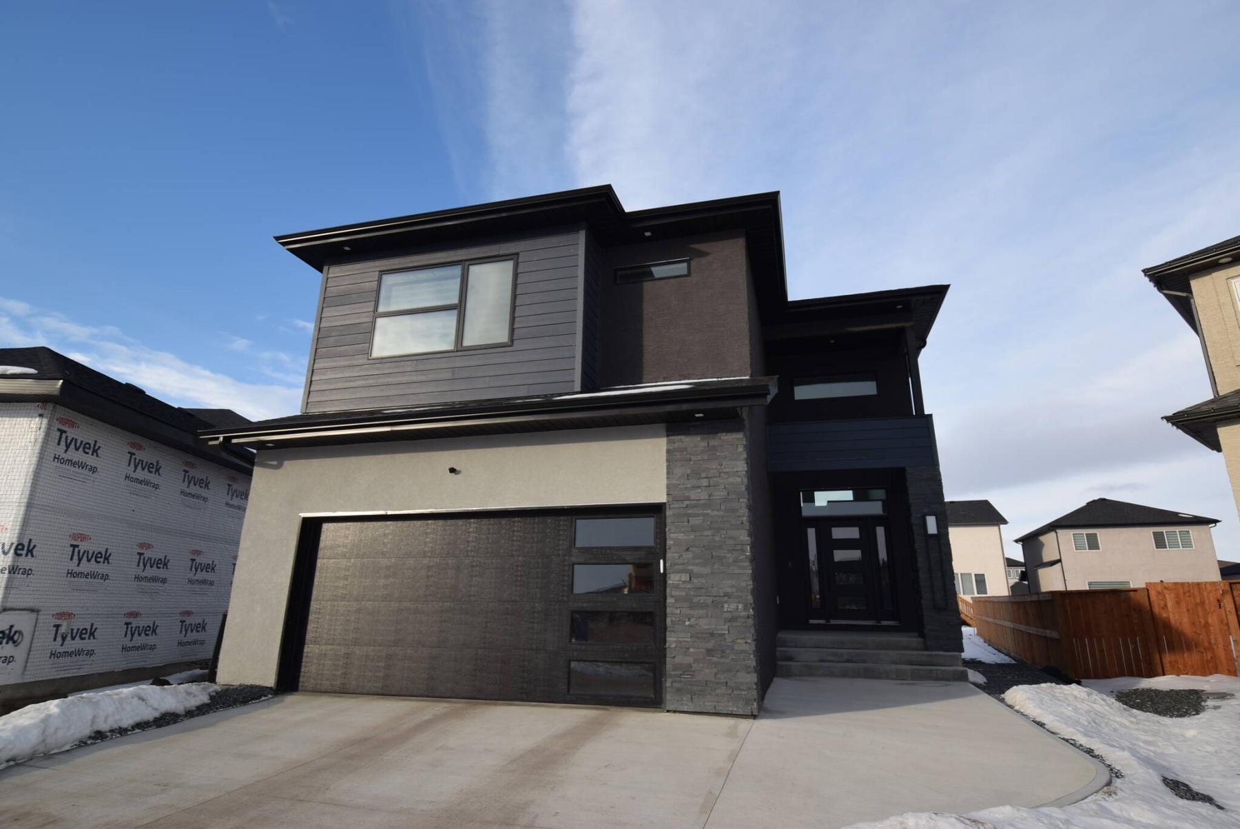  <p>Photos by Todd Lewys / Winnipeg Free Press</p>
                                <p>The custom-built two-storey is ready to go with upgraded finishes, appliances, a backyard deck and finished basement.</p> 
