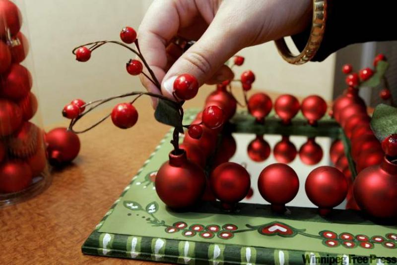 Transforming your home into a festive wonderland for your family doesn't have to be expensive. Shoppers should first turn to their attic for any scraps of holidays past â ribbons, pine cones and bows â to see if they can be reused.
