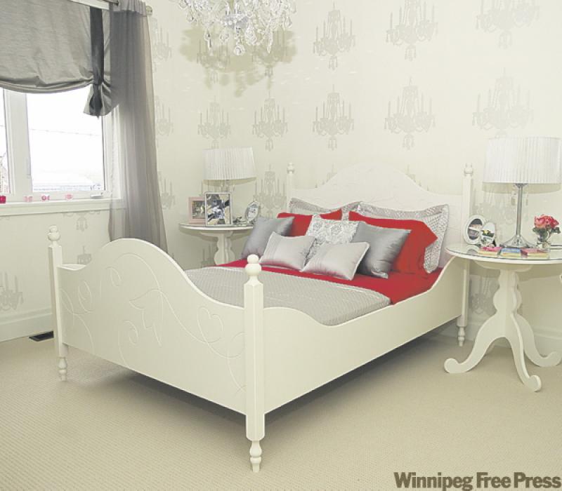 Tone-on-tone wallpaper looks like a shadowy silver  repeat pattern of the chandelier.