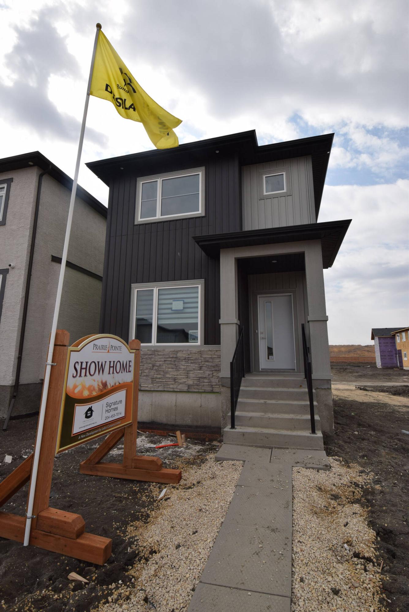  <p>TODD LEWYS / FREE PRESS</p>
                                <p>The two-storey Langley 26 design packs tons of value and livability into a 1,398-sq.-ft. package that lives much larger than its listed square footage.</p> 
