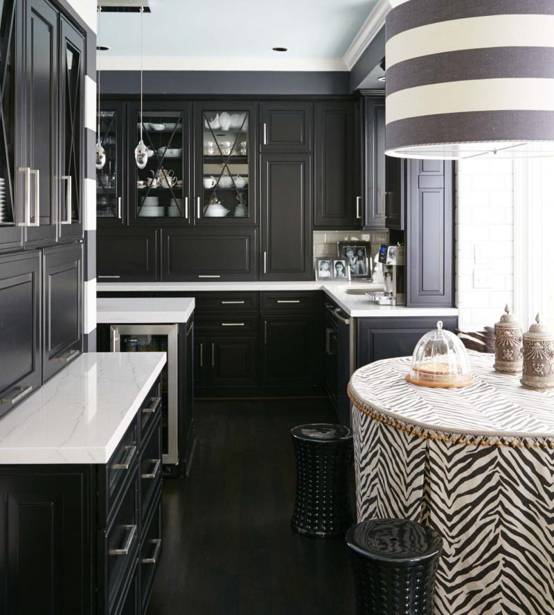 <p>Vern Yip / The Washington Post</p><p>Transitional black and white kitchens are on trend and rising in popularity. Omega’s transitional Clio door style in a black opaque finish pairs here with Cambria’s Ella quartz countertops to reflect a look that is both fresh and timeless.</p>