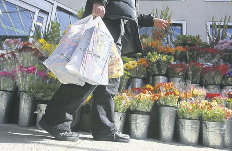 If you can't convince your city to ban them, at least re-use them: keeping old grocery bags in the car can come in handy for a number of reasons.
