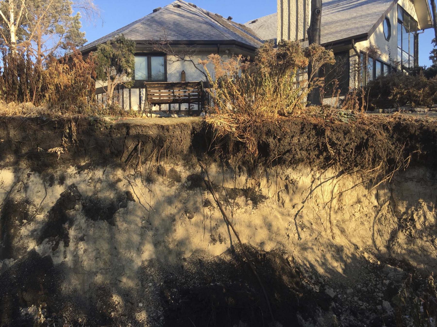 <p>Photos supplied by Raymond Normandeau</p><p>A massive hole opened up on Raymond Normandeau&rsquo;s riverbank property following a riverbank collapse in November.</p>