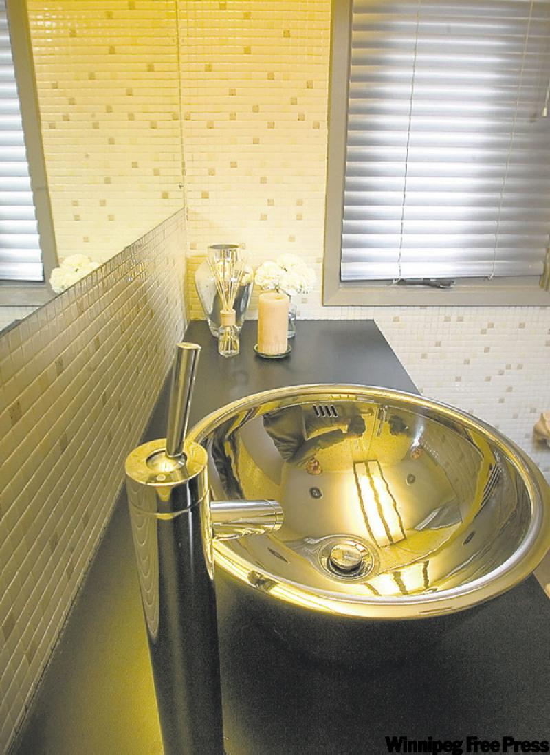 Crazy chrome tap in powder room off the kitchen.