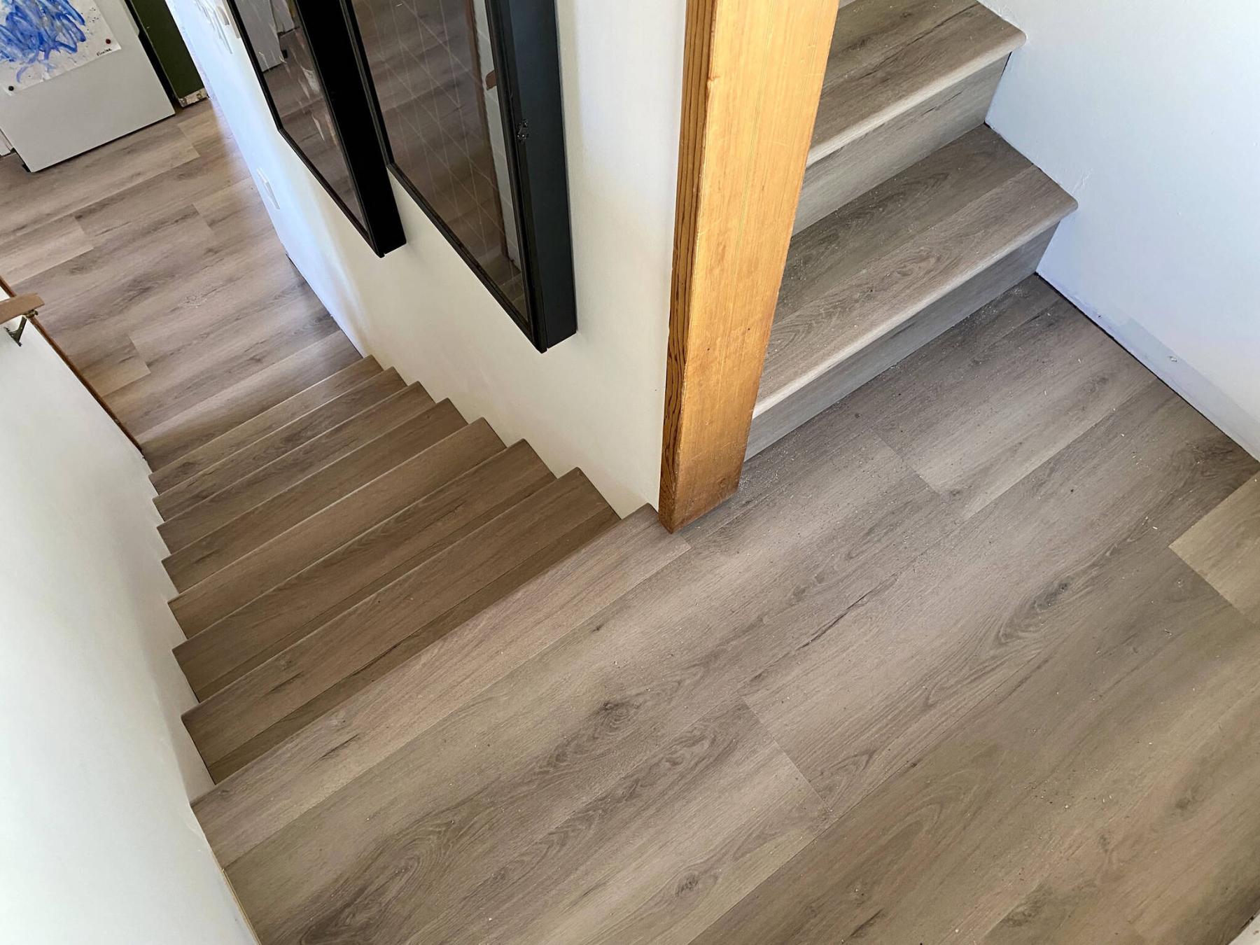  <p>MARC LABOSSIERE / FREE PRESS</p>
                                <p>Vinyl-plank flooring and nosing are installed along the staircase to match the newly installed vinyl throughout the rest of the house.</p> 
