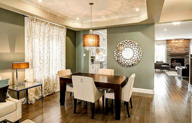 The size of the room helps determine both the size and shape of your dining table.
