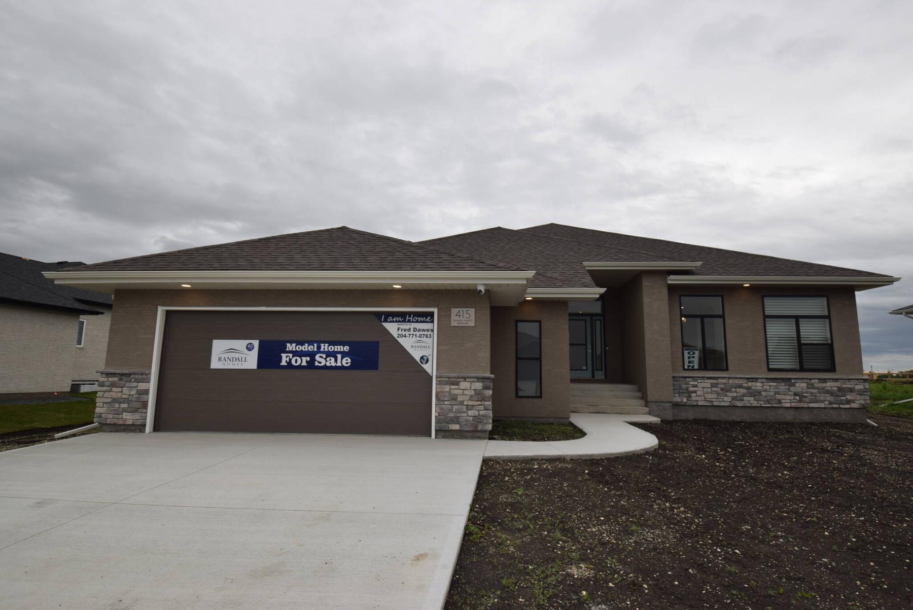  <p>Photos by Todd Lewys / Free Press</p>
                                <p>This bungalow sits on a huge country-sized lot and is inviting, stylish and livable.</p> 