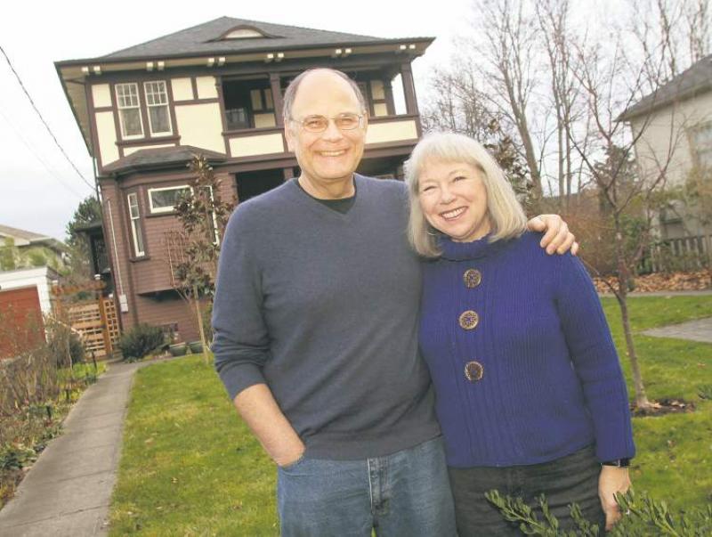 Bea and Lawrie Cherniack pose in front of their dream heritage home in Victoria.