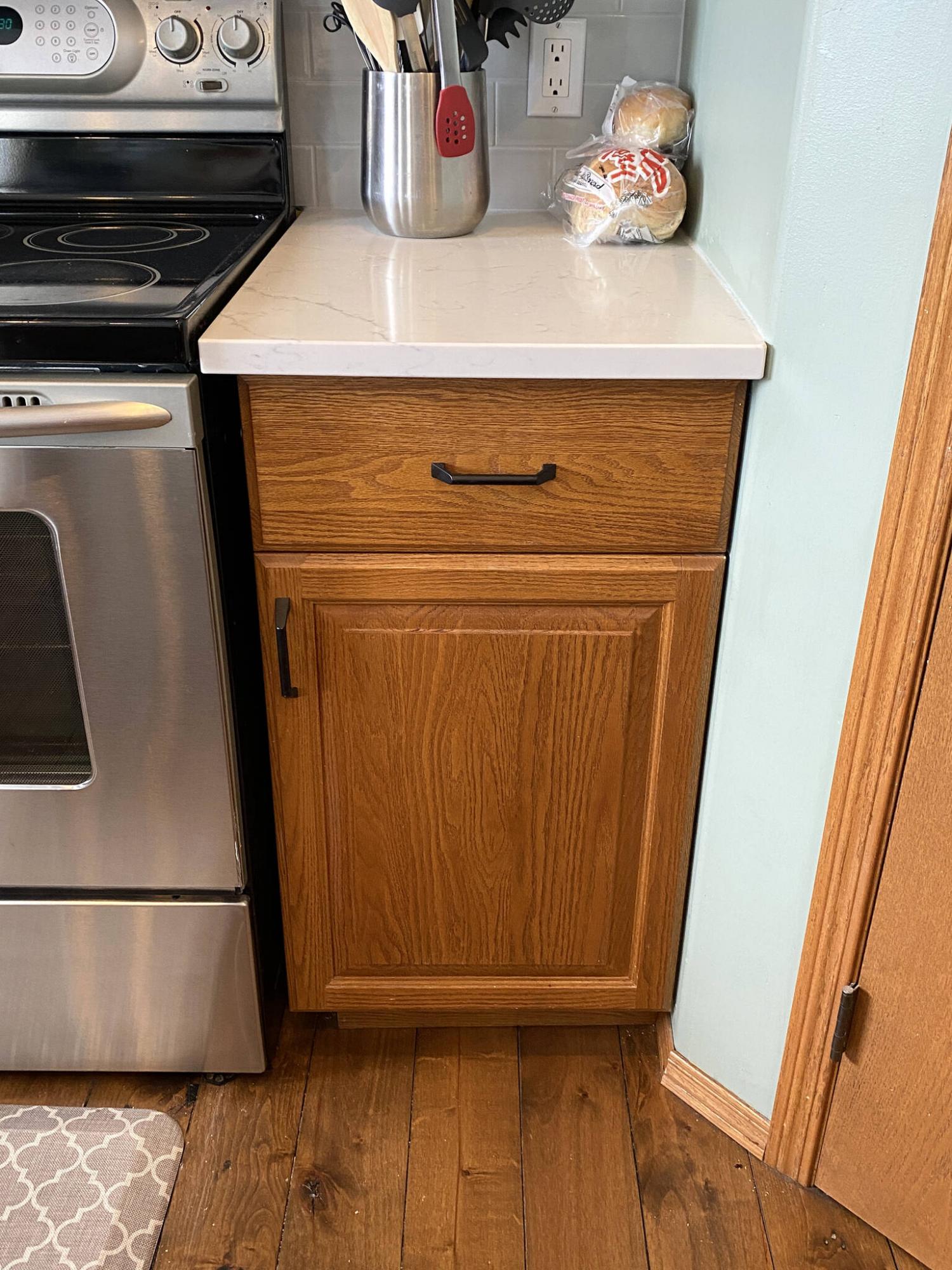 <p>Photos by Marc LaBossiere / Winnipeg Free Press</p><p>Although the cupboard now serves as a pull-out drawer, it still mimics the old cabinets in appearance.</p>
