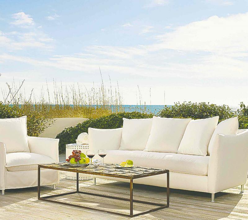 Weather resistant fabrics like the Sunbrella material covering this sofa and chair means outdoor living can involve furniture thatâs as comfortable as the pieces we have inside the house.