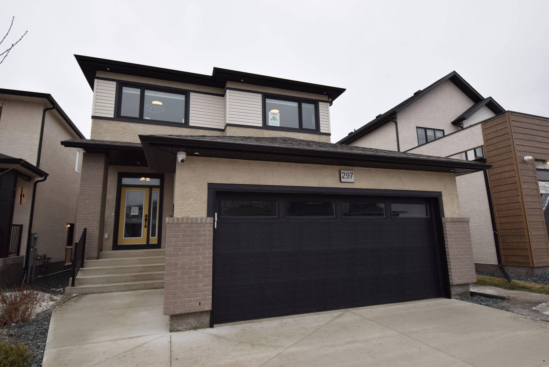  <p>TODD LEWYS / FREE PRESS</p>
                                <p>The efficiently designed Florence model proves a home need not be over 2,000 sq. ft. in size to offer the functionality families require.</p> 