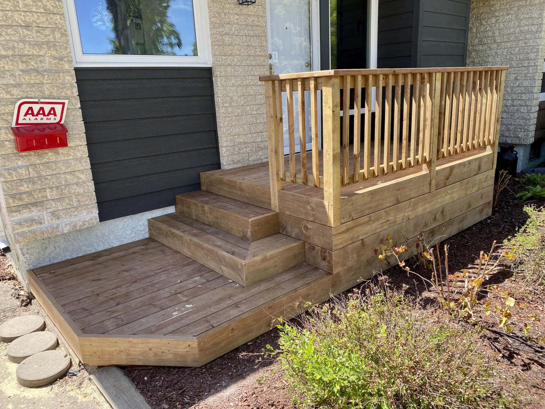 <p>The larger footprint of this attractive wooden porch improves function and curb-appeal. </p>
