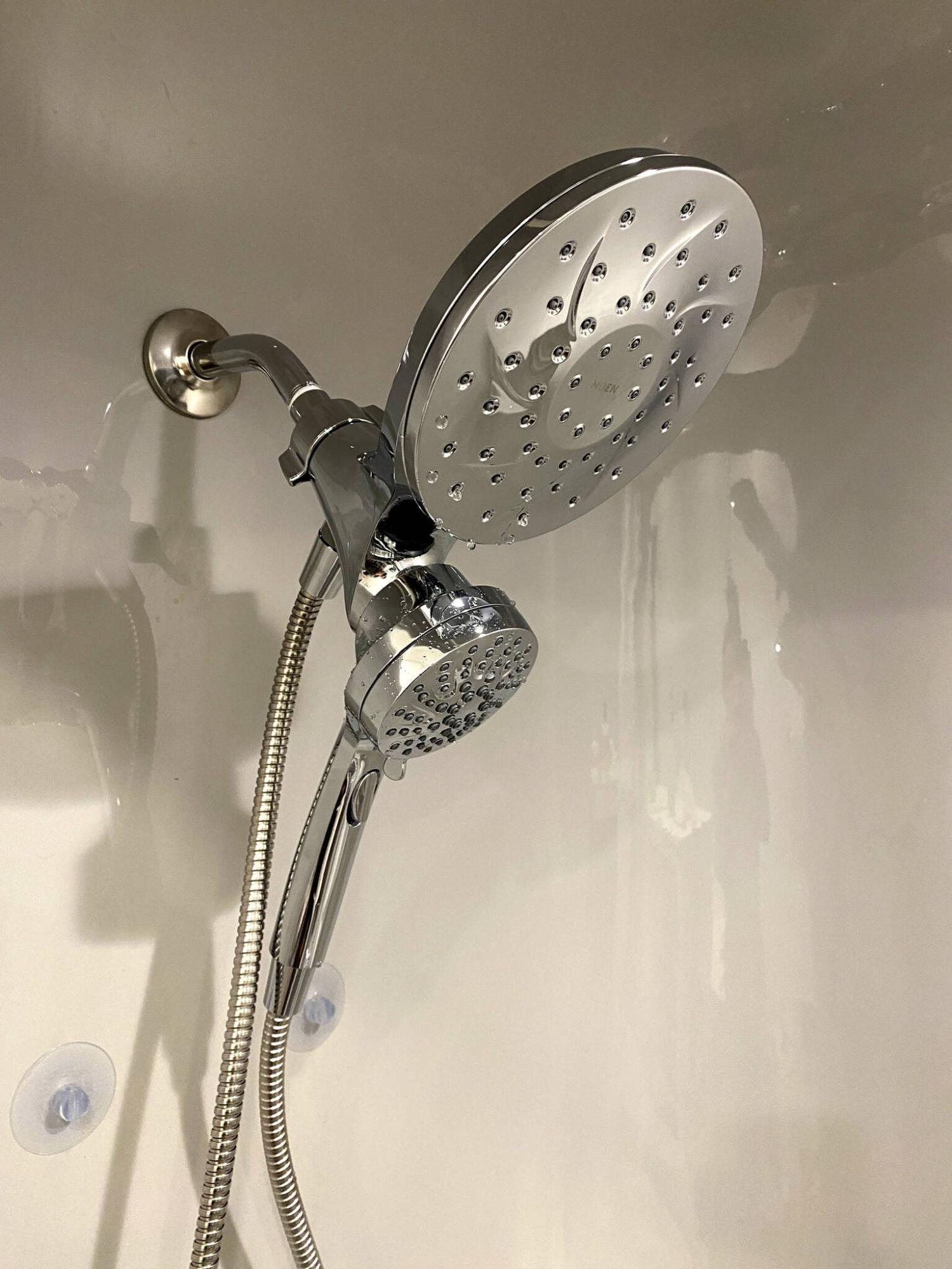  <p>Marc LaBossiere / Free Press</p>
                                <p>A new Moen shower head with a hand wand mounts using a magnet.</p> 