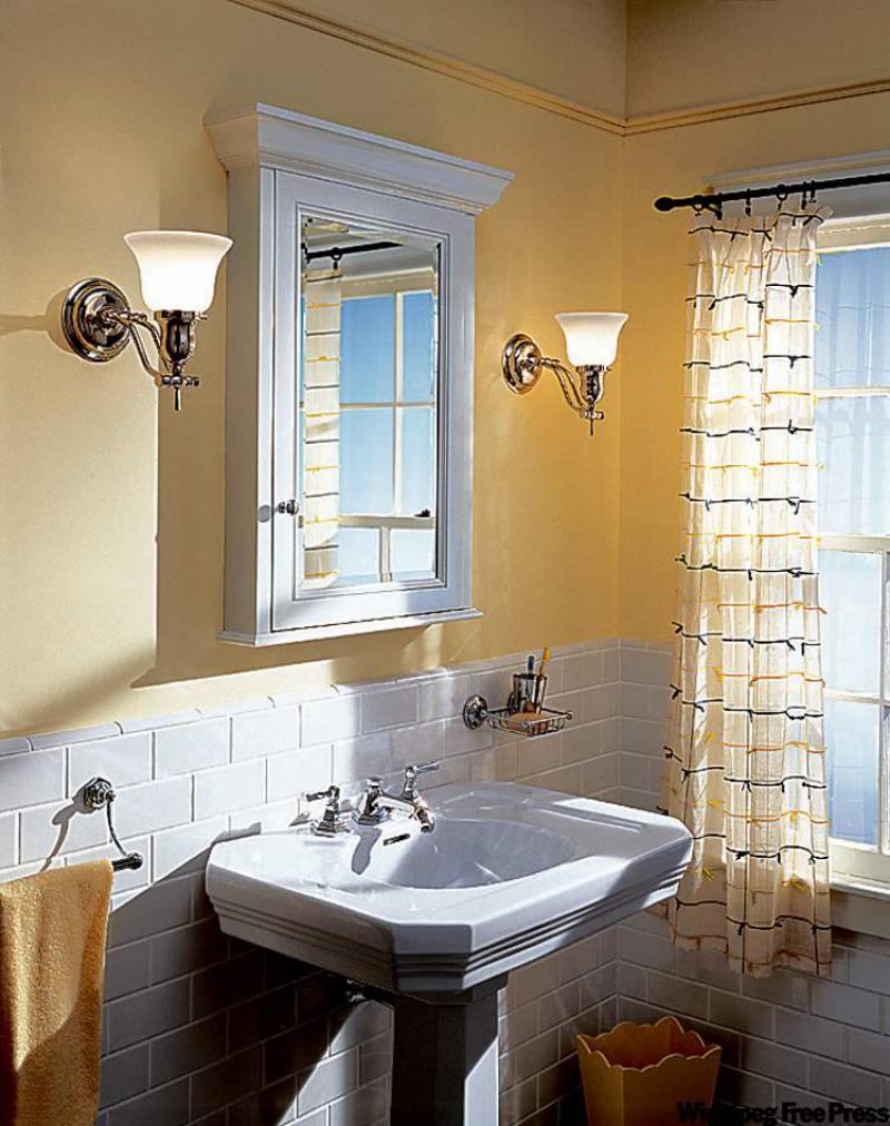 This lovely, quaint bathroom (photo courtesy of Kohler) is a perfect example of how adding a few new touches can rejuvenate a tired bathroom. This small, older-style bathroom has been brought up to date with fresh paint and accessories, yet still maintains its vintage charm.