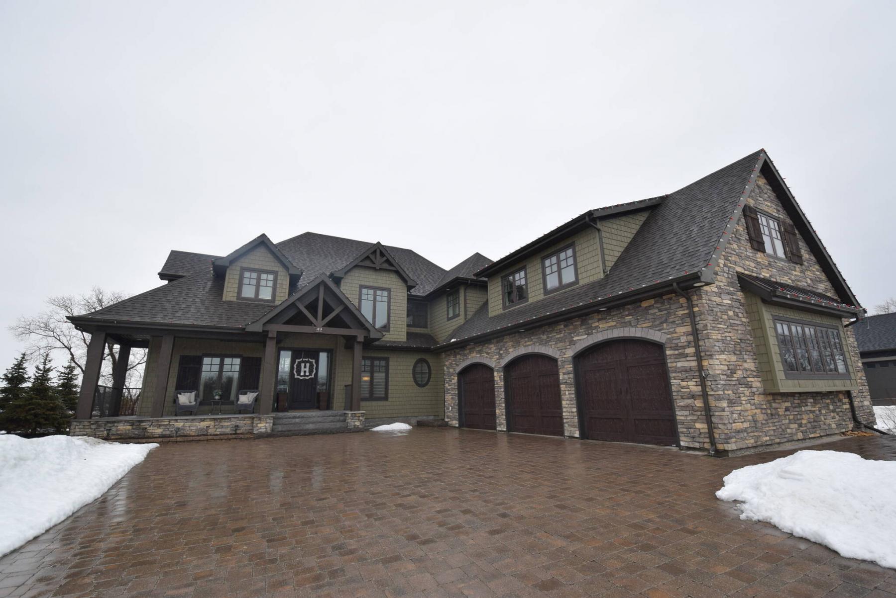 <p>Photos by Todd Lewys / Winnipeg Free Press</p><p>The home&rsquo;s impeccable design starts with a countrified Hardie board, cultured stone and cedar shake exterior that ties in beautifully with the home&rsquo;s countrified surroundings.</p>