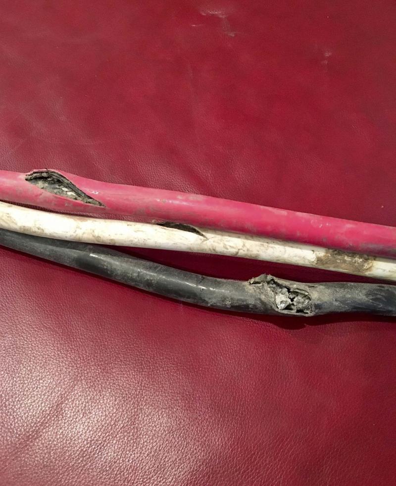 <p>Photo by Marc LaBossiere / Winnipeg Free Press</p><p>Damage to the 200-amp electrical line after the bucket of a bobcat hit the live feed and blew the fuses at disconnect near the MB Hydro meter. </p>