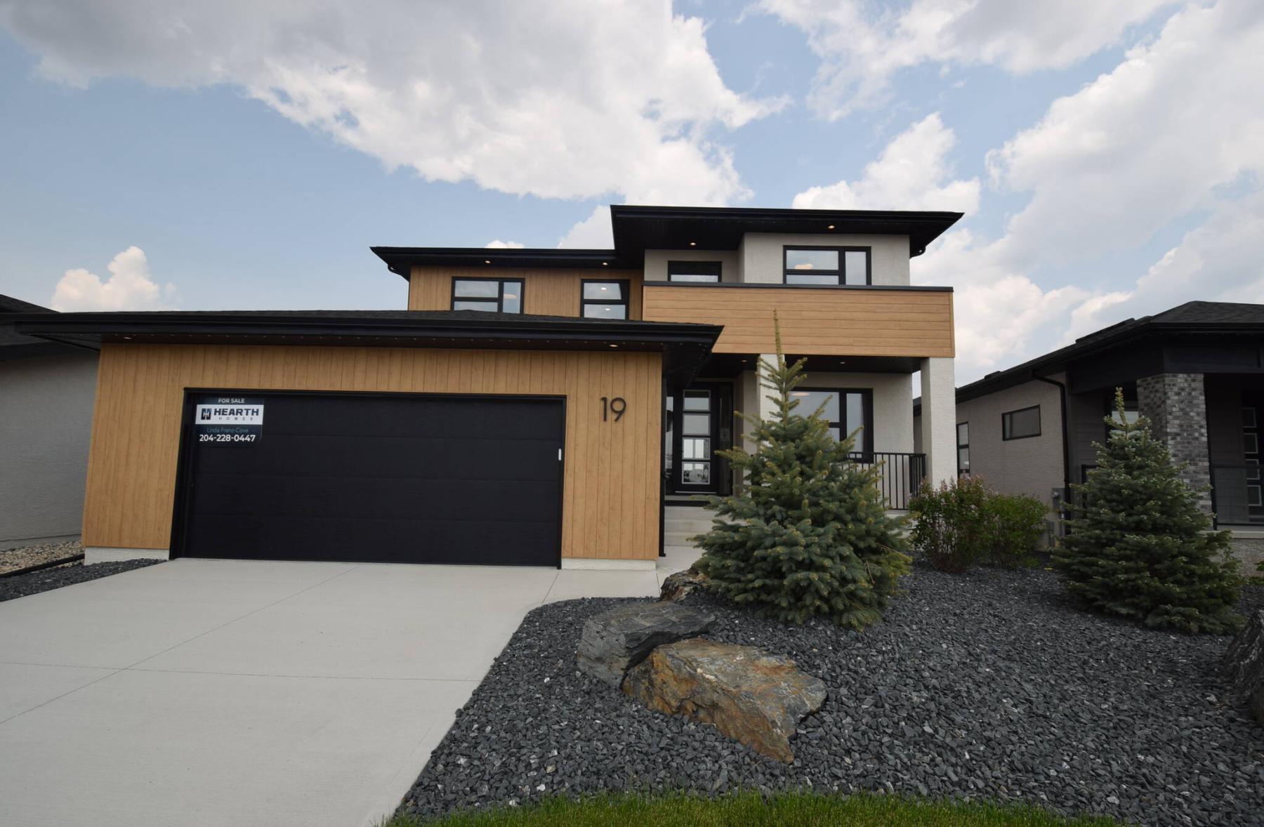  <p>Todd Lewys photos / Free Press</p>
                                <p>Clad in durable metal woodgrain-style siding, 19 Oasis is a warm, inviting luxury home that&rsquo;s all about function and elegant, understated style.</p> 