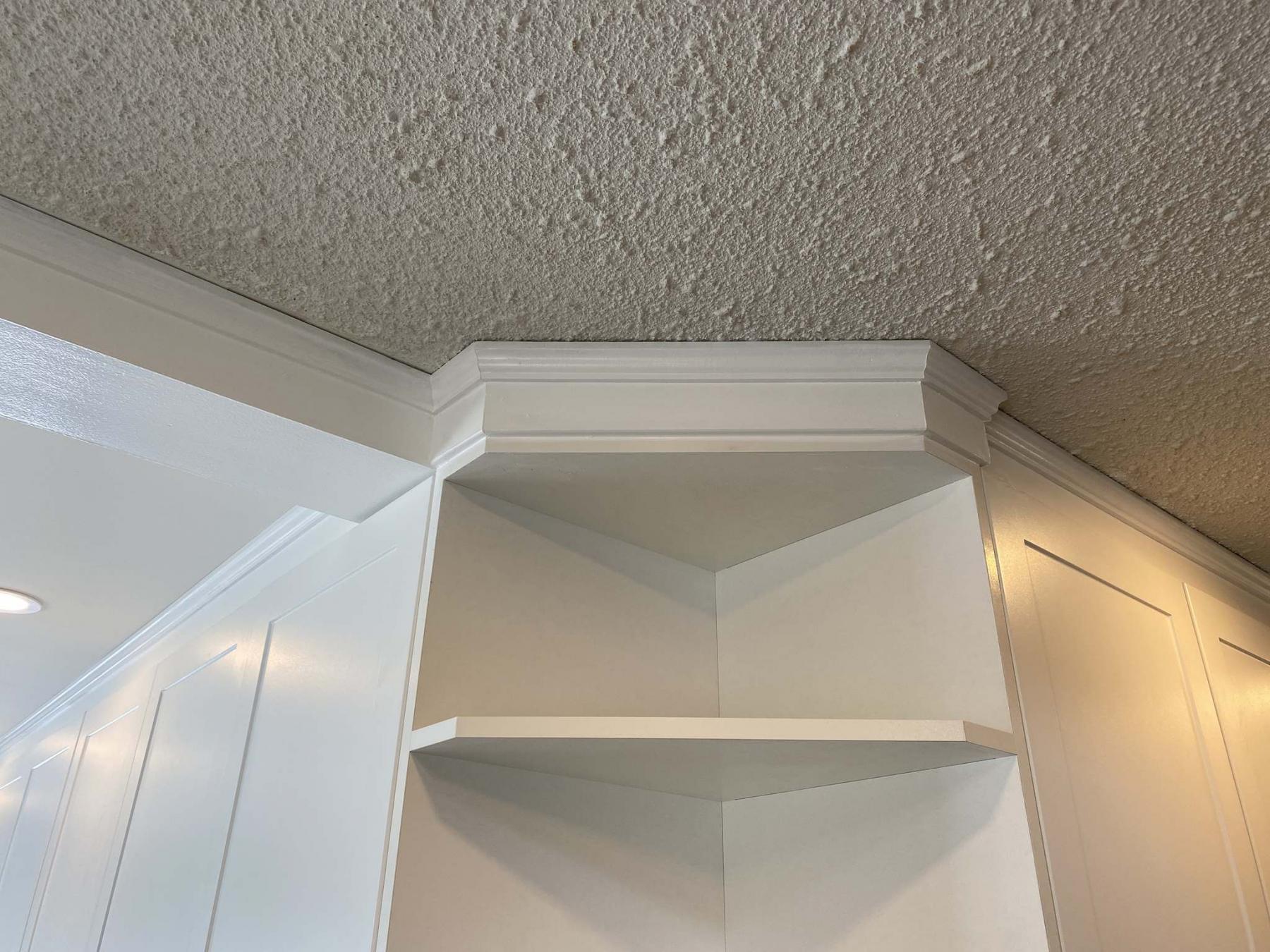 <p>The height of the upper cupboards was adjusted to incorporate the beam height.</p>