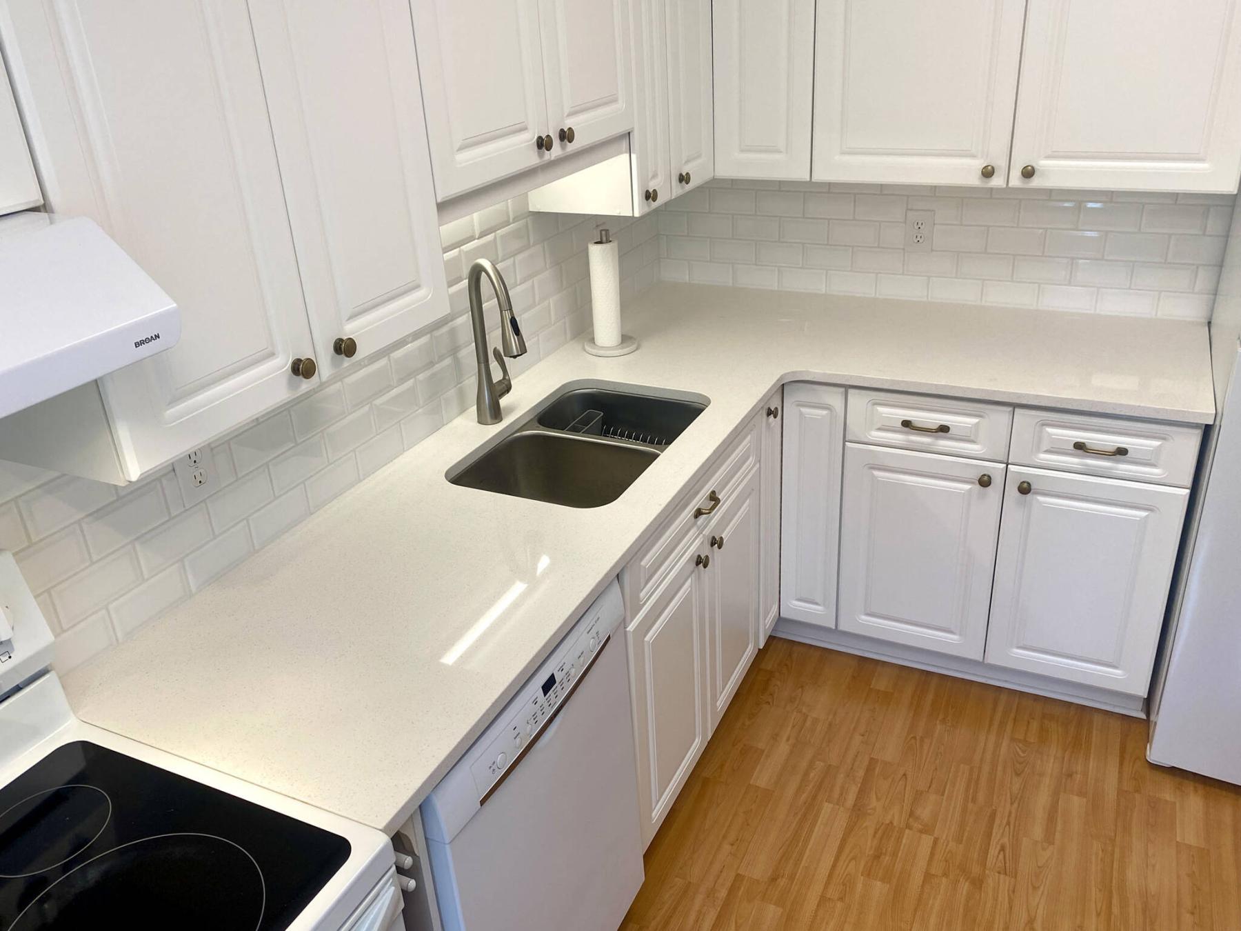  <p>Marc LaBossiere / Free Press</p>
                                <p>The new L-shaped quartz countertop is complemented by the introduction of an undermount sink and new faucet.</p> 