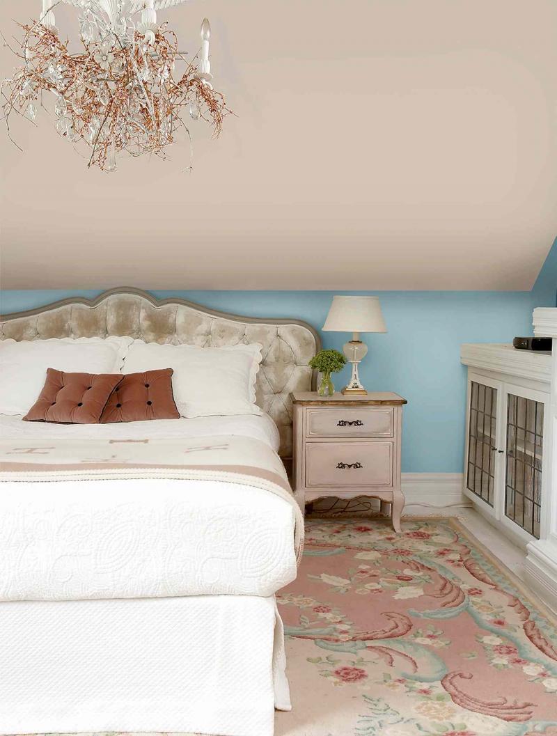 The headboard on this bed is lower than most and fits well against the short wall.